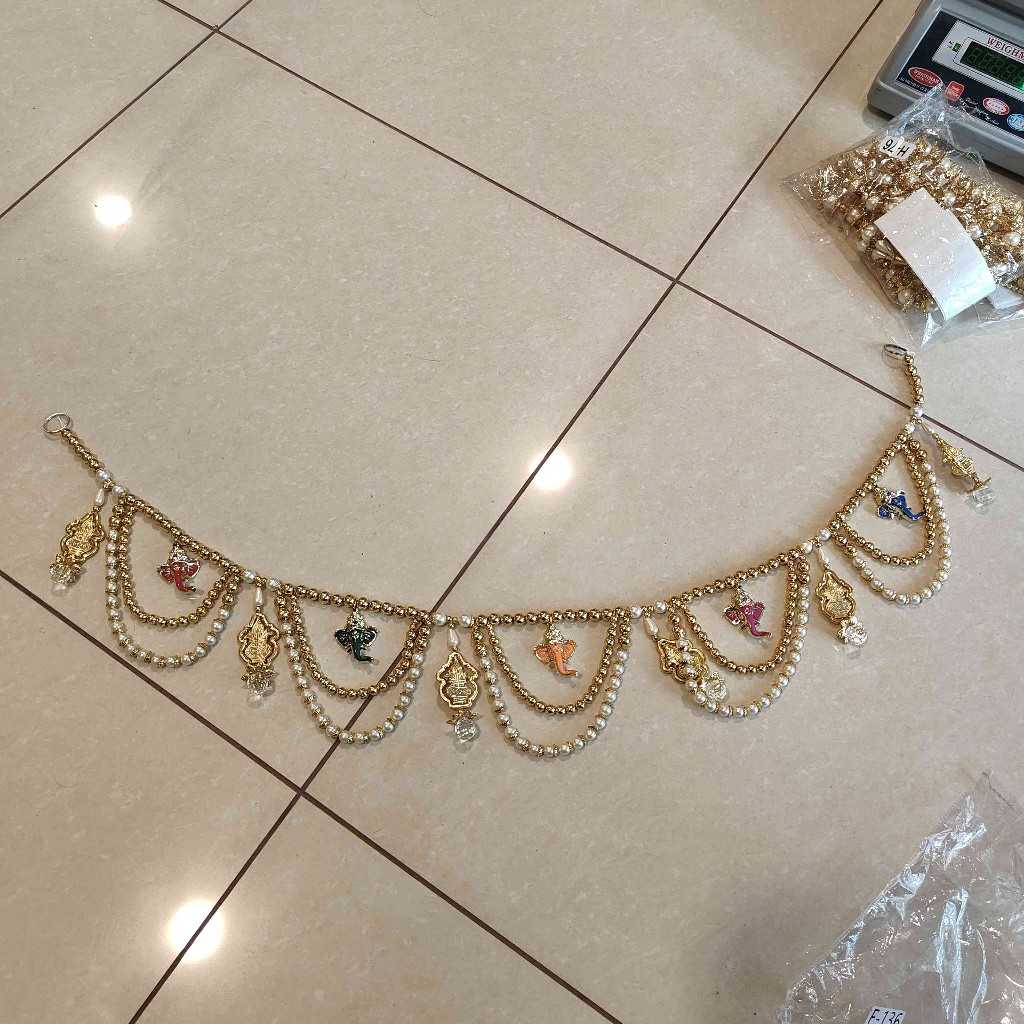 GOLDEN PEARL GANESH TORAN