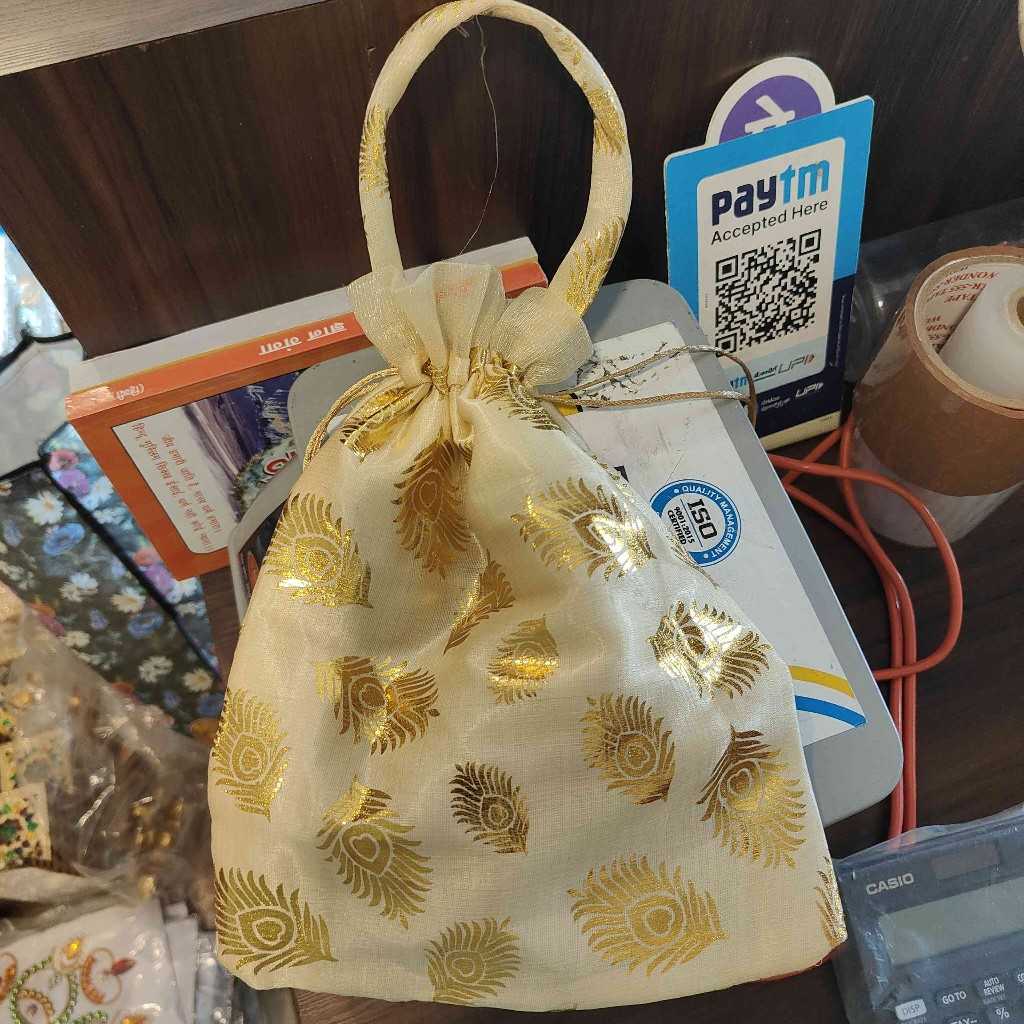 GOLDEN PEACOCK POTLI BAG CREAM