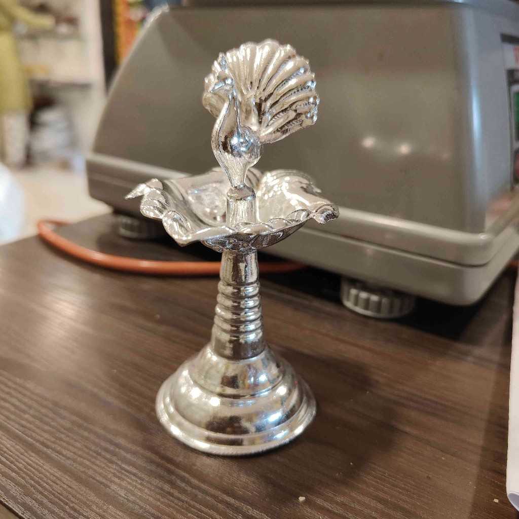 GSB HAND PEACOCK DIYA LONG