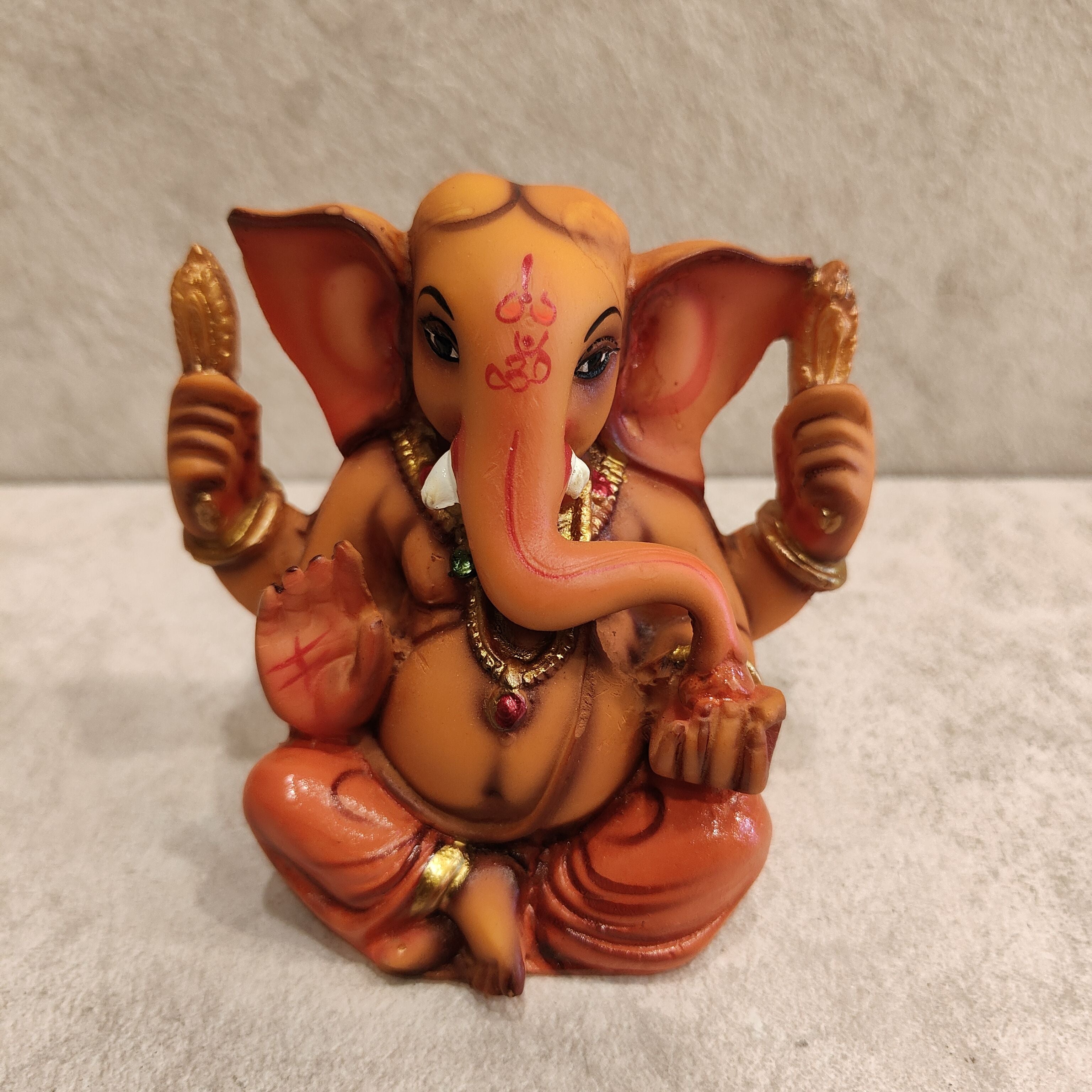 Ganesh Saffron Figurine Assorted