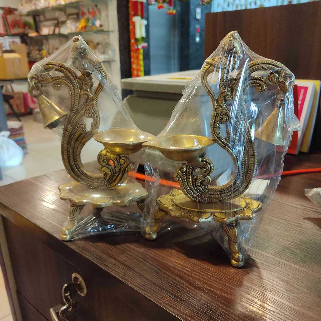 Brass Peacock Diya With Bell Set Of Two