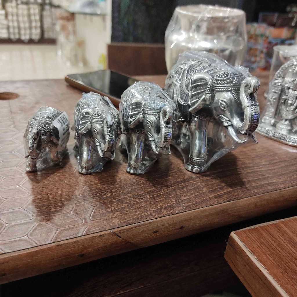 ANTIQUE GERMAN SILVER ELEPHANT SET OF 4
